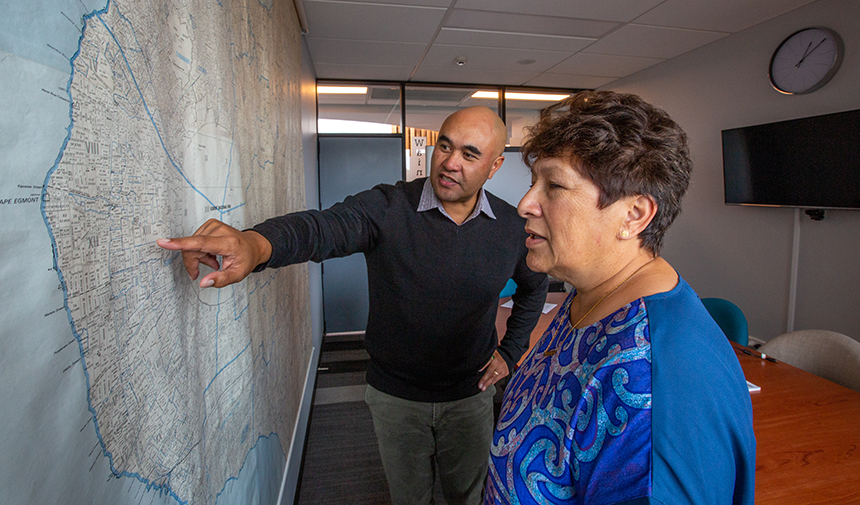 2 people looking at a map together.